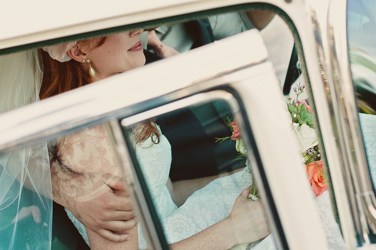 Bride in a wedding car