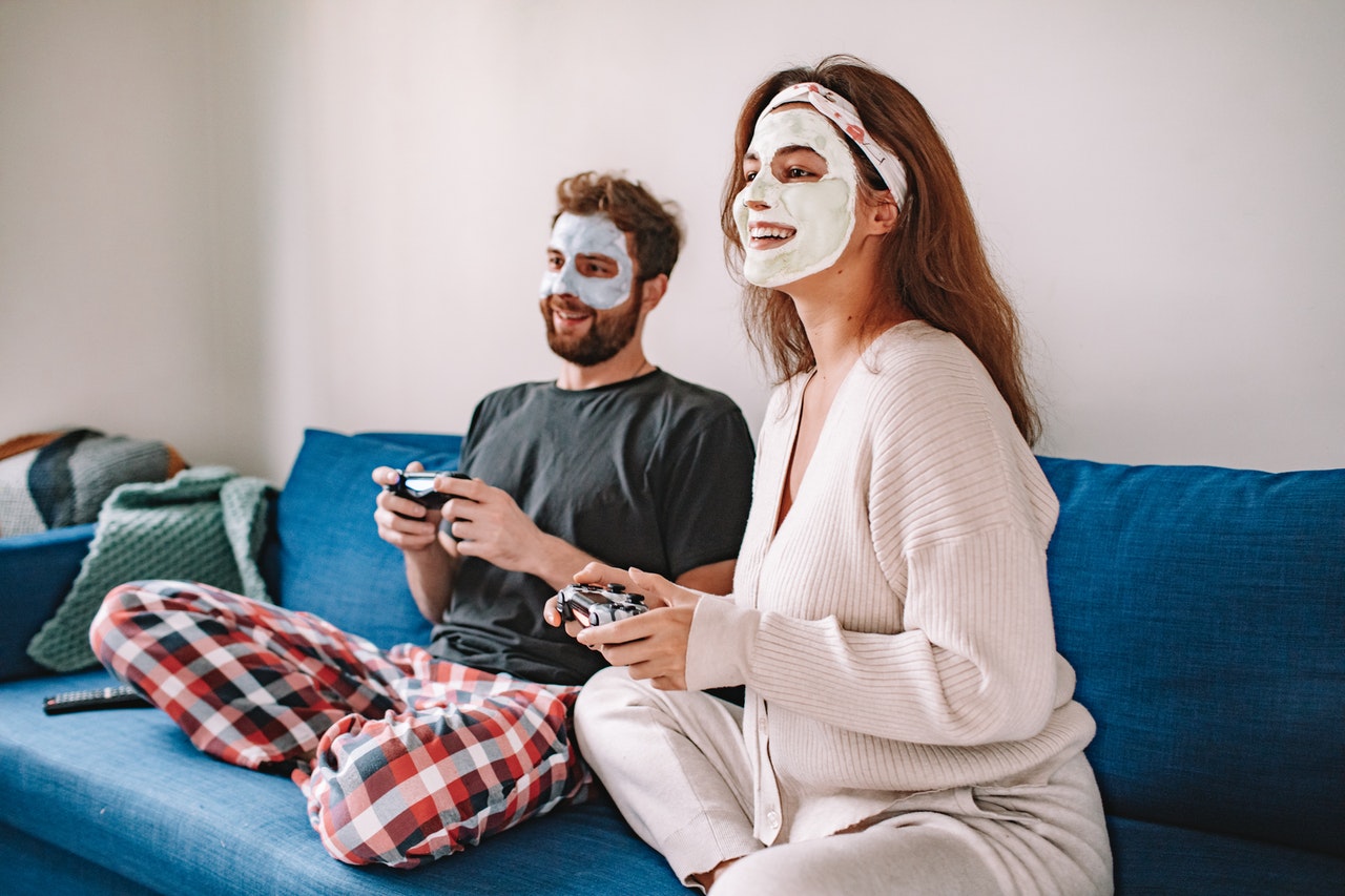 Married Couple Playing Video Game