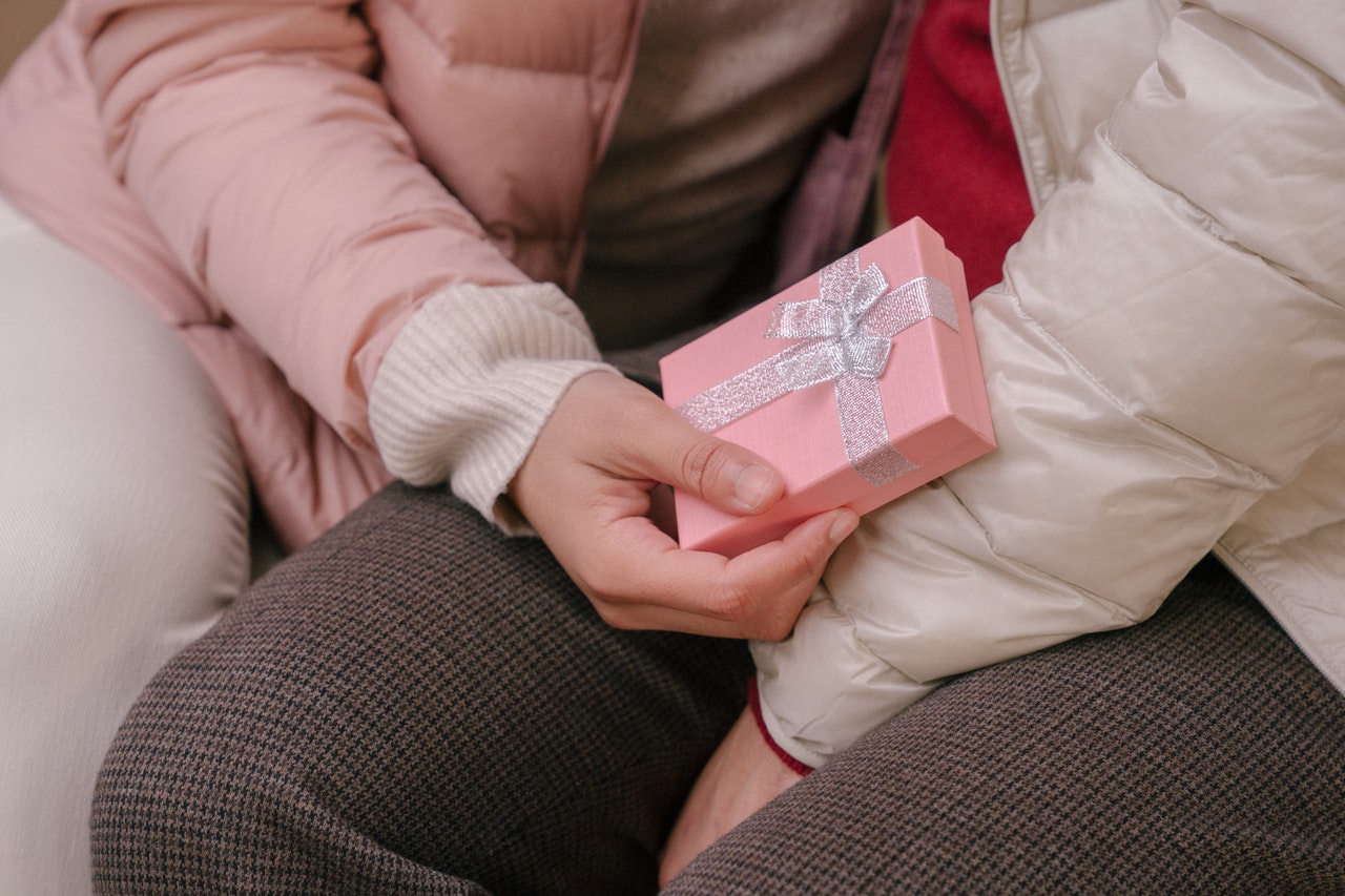 Couple giving gifts